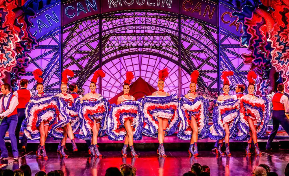 a group of women on Moulin Rouge's stage